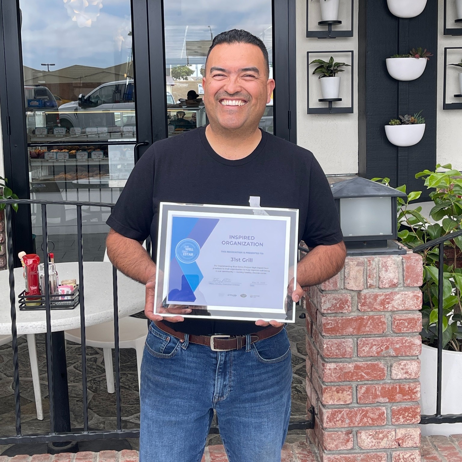 Eddie Estrada receives Blue Zone certificate